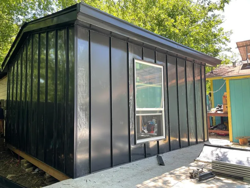 Black standing seam metal wall panels for Roof Inspection in Adrian