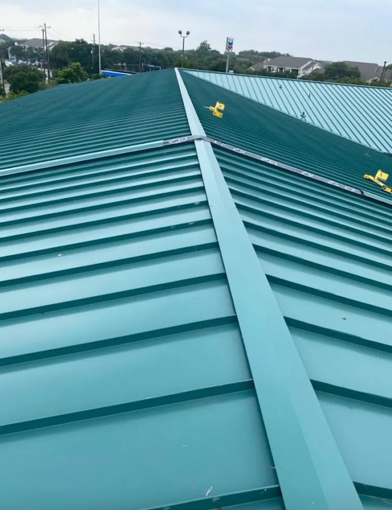 Green commercial metal roof ridge and valley for Metal Roof Repair in Adrian